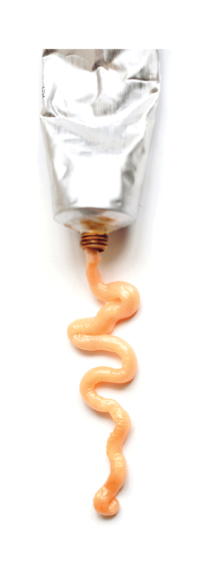 Squeezed out tubes of hair dye on a white background 1